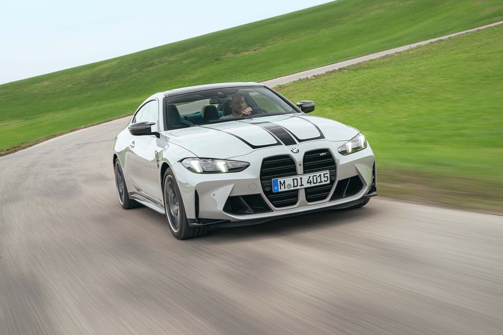 2025-bmw-m4-coupe-front-motion-65b935e5f1a74.jpg