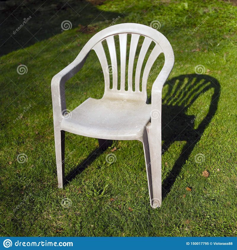 plastic-garden-chair-placed-grass-outdoor-shot-150017795.jpg