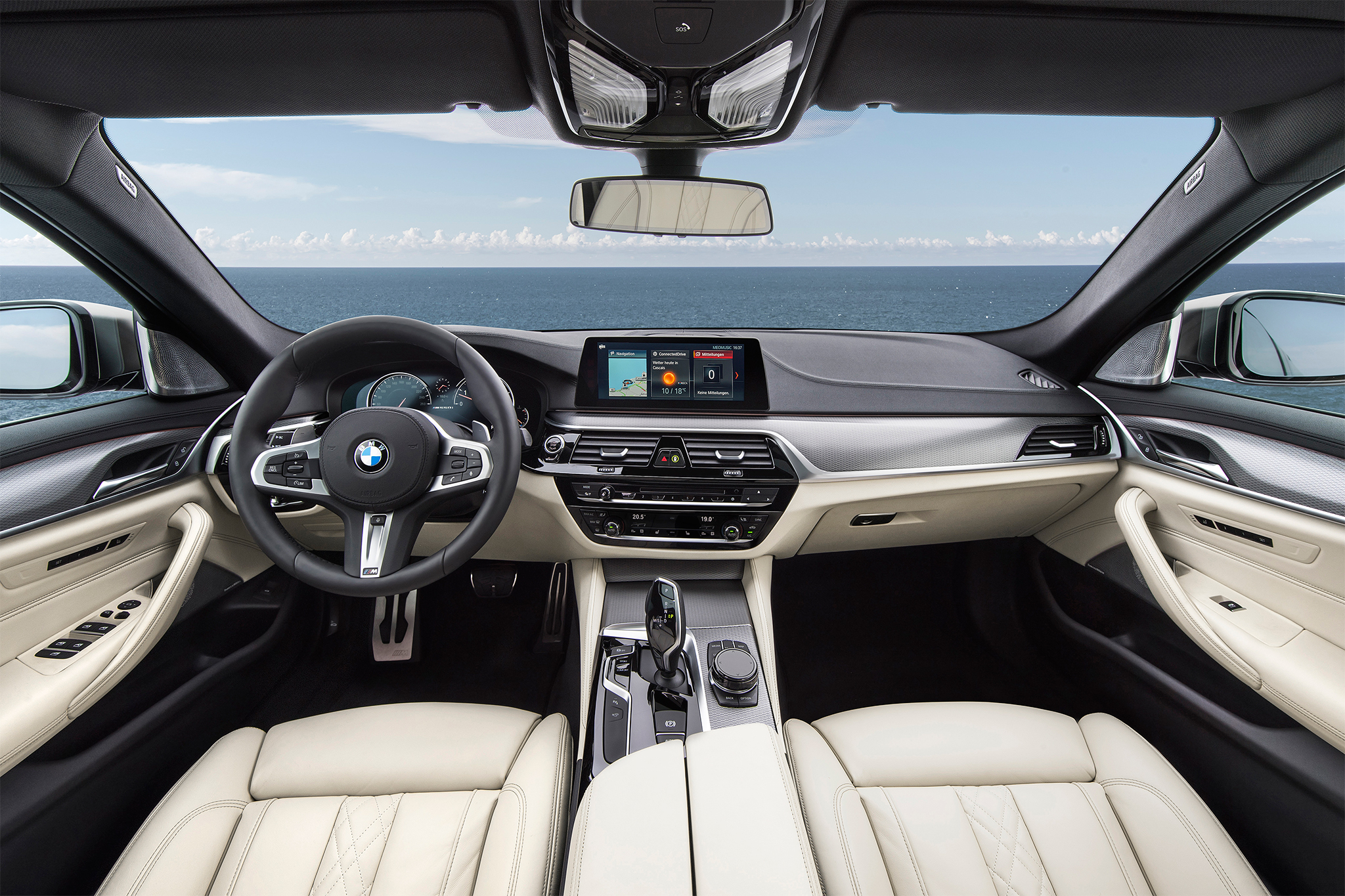 2018-BMW-M550i-xDrive-cabin.jpg