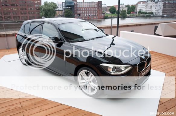 2012-BMW-1-Series-Black-Headlight-View.jpg